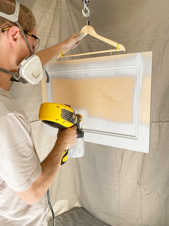 Easy way to paint a door. Not very cost effective if you have a lot of