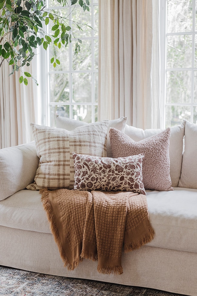 4 Tips for Decorating With Throw Pillows In Your Bedroom - Lily & Val Living