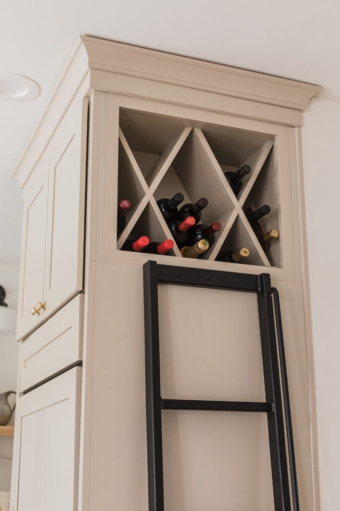 https://www.jennasuedesign.com/wp-content/uploads/2022/01/wine-cabinet-above-fridge-683x1024.jpg