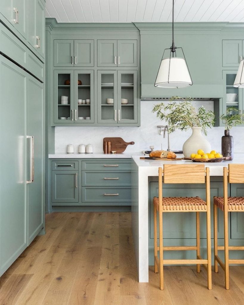 green cabinets with blue walls        <h3 class=