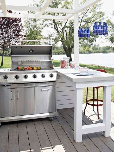 outdoor grill under pergola